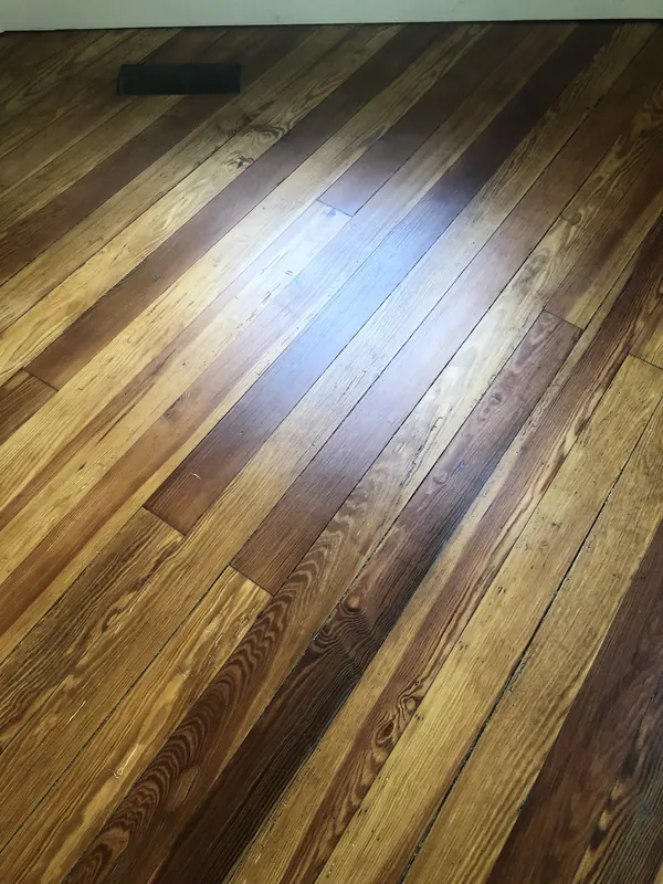 Rich multi-toned reclaimed boards with knots and nail marks