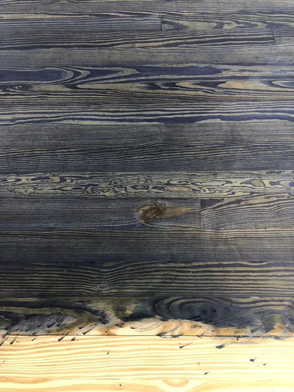 Weathered timber boards in blue and grey tones