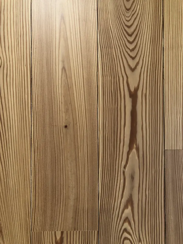 Detail of heart pine grain sweeping across a wide board