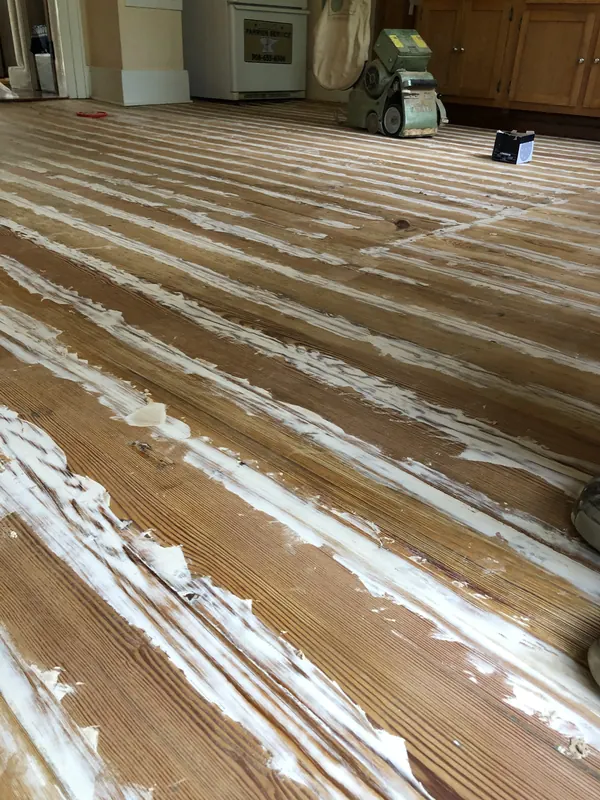 Heavily figured floor with rippling light and dark bands