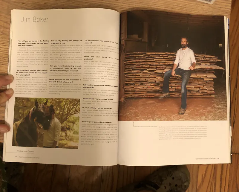 Magazine spread featuring a craftsman seated against stacked timber