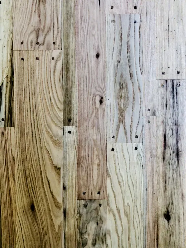 Reclaimed oak boards with dark square cut-nail heads