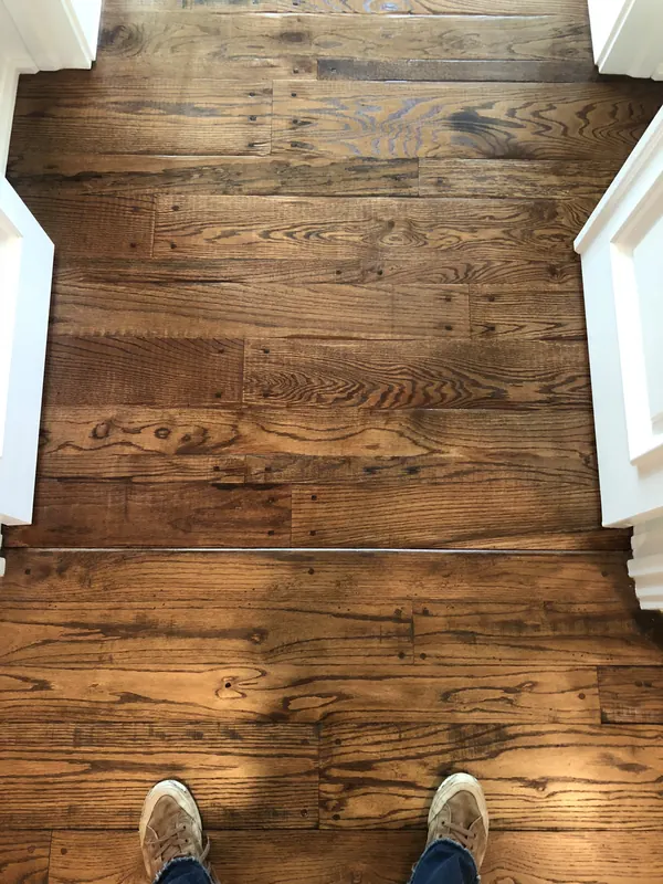 Rich dark brown boards with a soft sheen