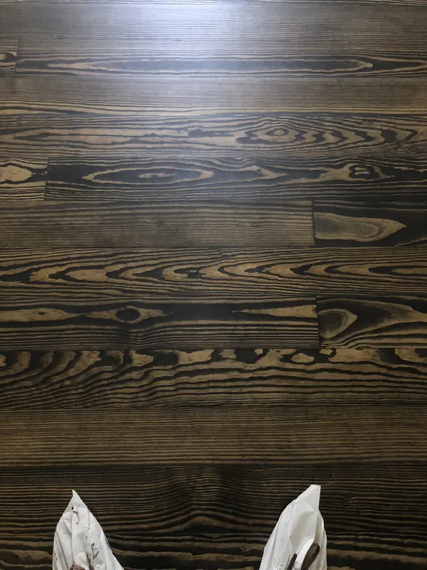 Very dark boards with raised grain texture