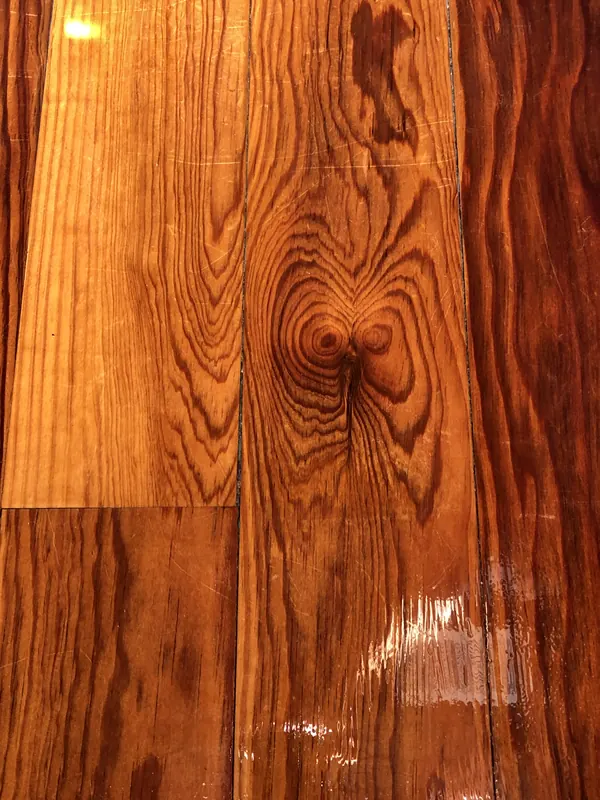 Glossy orange-red heart pine boards