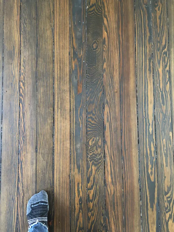 Very dark wide boards with subtle grain