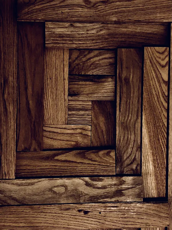 Interlocking parquet blocks in a woven pattern